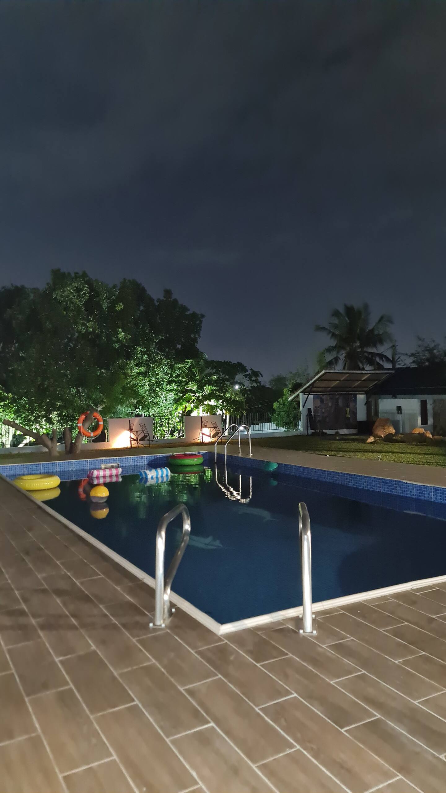 Swimming pool illuminated in the evening at Summit Escape Gardens